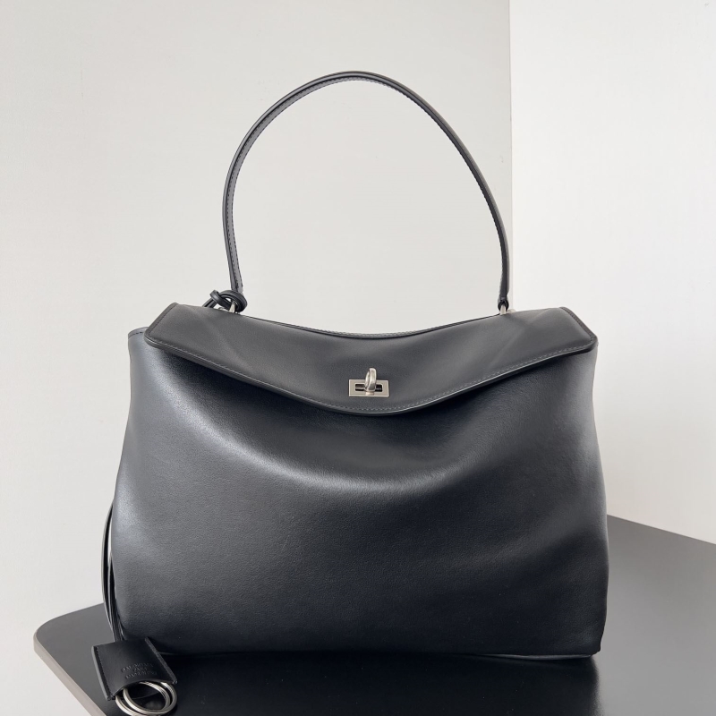 Ba*len*cia*ga top handle bags